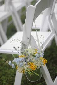 Wedding ceremony chair flower decoration